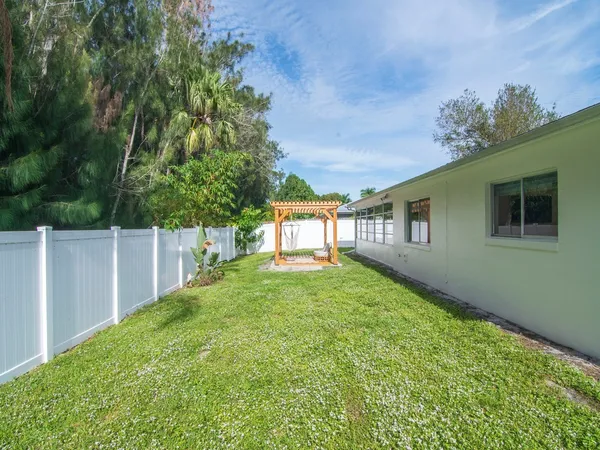 a house view with a garden space
