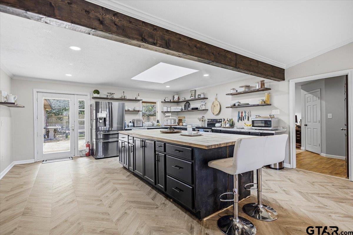 18919 State Highway 64 Canton, TX 75103 - Photo 15 of 42 a kitchen with stainless steel appliances granite countertop a stove and cabinets