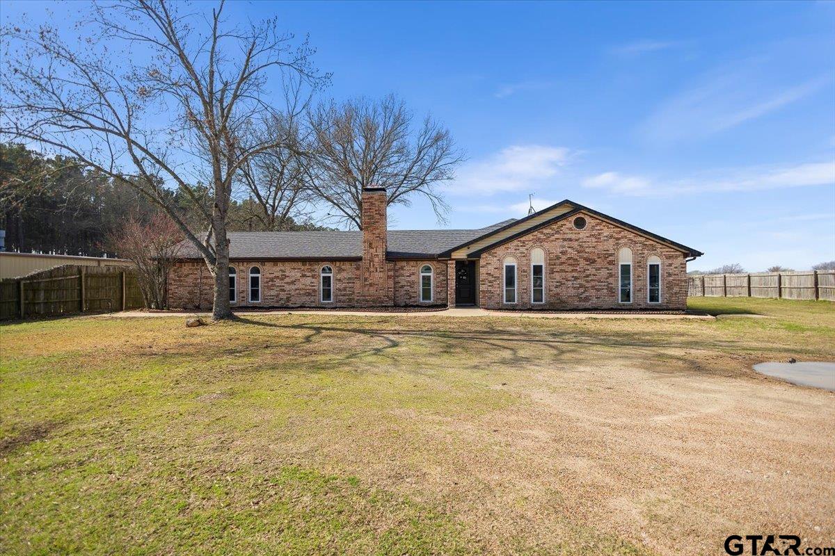 18919 State Highway 64 Canton, TX 75103 - Photo 2 of 42 a swimming pool with outdoor seating and yard