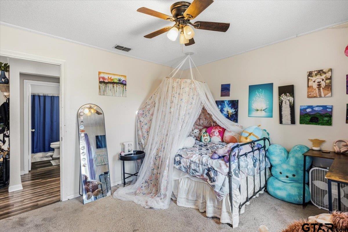 18919 State Highway 64 Canton, TX 75103 - Photo 23 of 42 a living room with lots of furniture and a chandelier