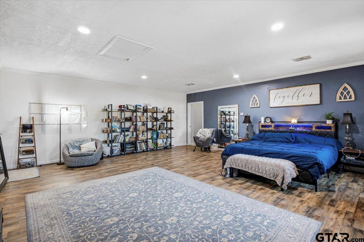 18919 State Highway 64 Canton, TX 75103 - Photo 32 of 42 a bed room with gym equipment and a window