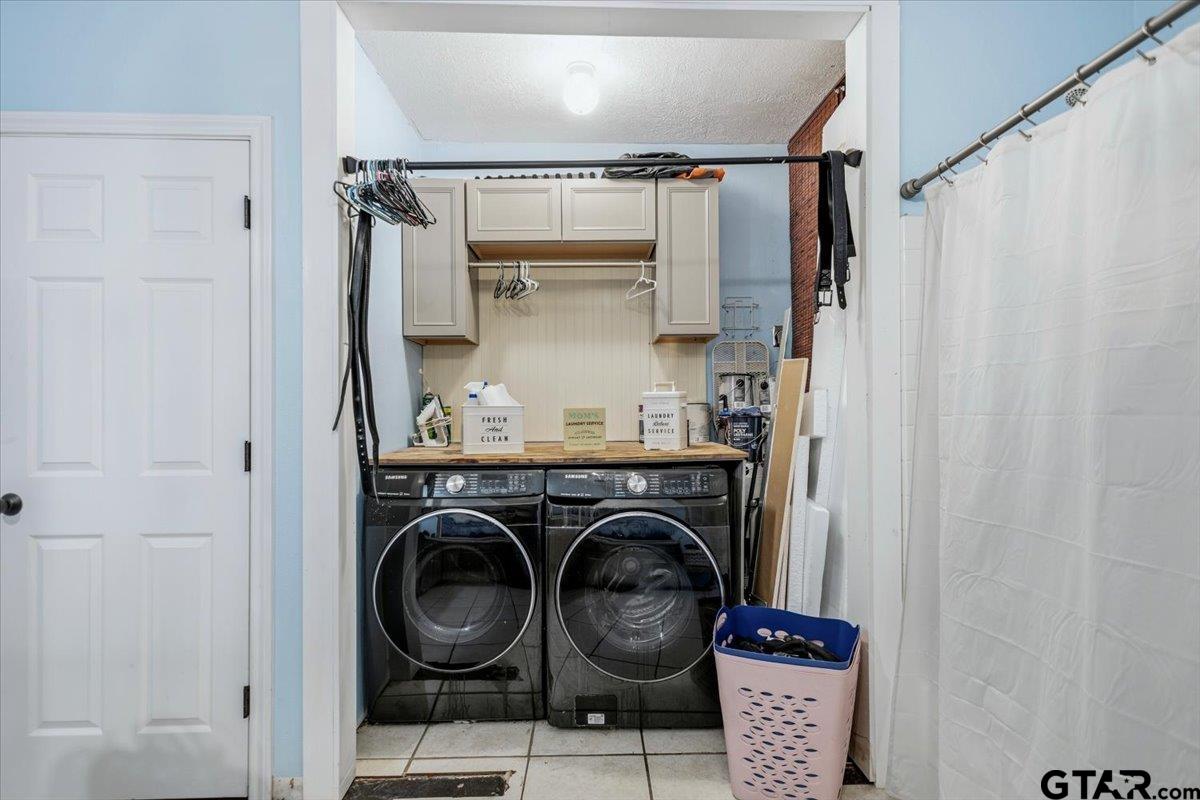 18919 State Highway 64 Canton, TX 75103 - Photo 34 of 42 a utility room with sink dryer and washer