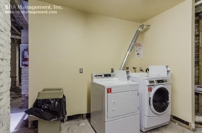 4 Cypress Road, Unit 406 Boston, MA 02135 - Photo 15 of 31 a utility room with dryer and washer
