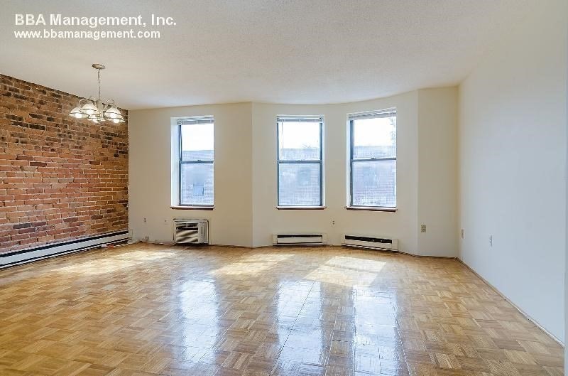 4 Cypress Road, Unit 406 Boston, MA 02135 - Photo 22 of 31 a view of an empty room with a window