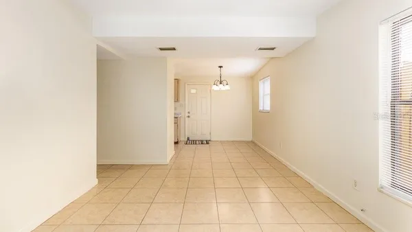 a kitchen with a sink cabinets and window