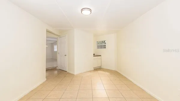 a bathroom with a shower a toilet and sink