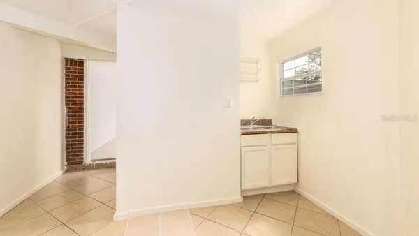 a view of an empty room with window