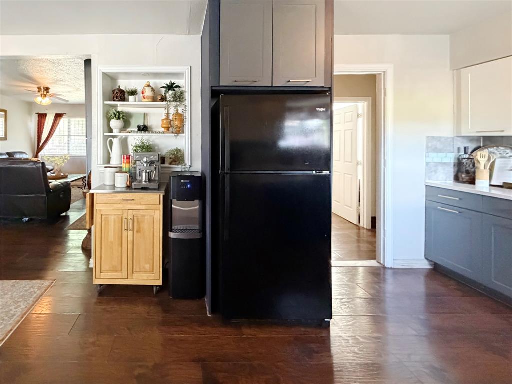 2243 Inca Drive Dallas, TX 75216 - Photo 6 of 24 Built-in shelving offers a great space for a coffee bar area.