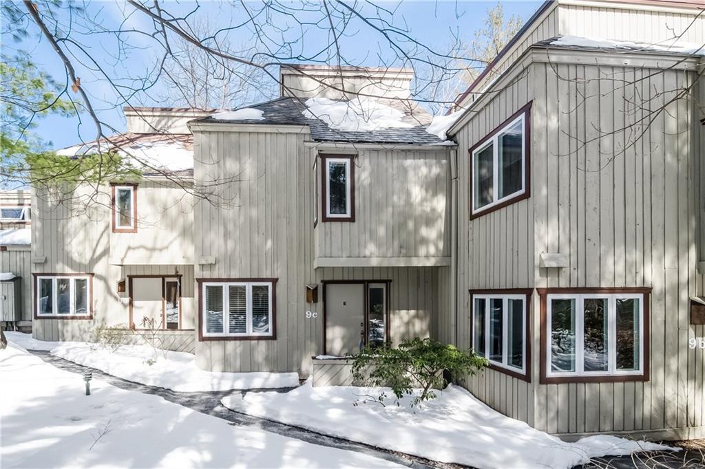 9 Talcott Glen Road, Unit C Farmington, CT 06032 - Photo 1 of 1 a front view of a building with street view