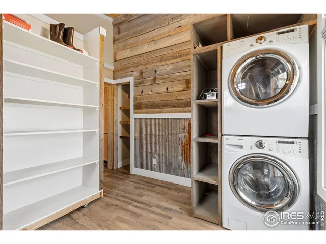 a view of a terrace with wooden floor and seating space