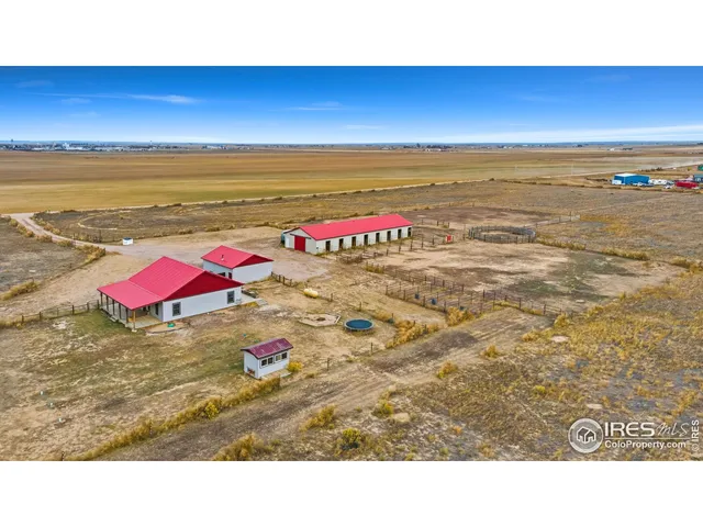 a view of a backyard of the house