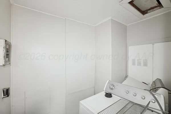 a bathroom with a sink and a window
