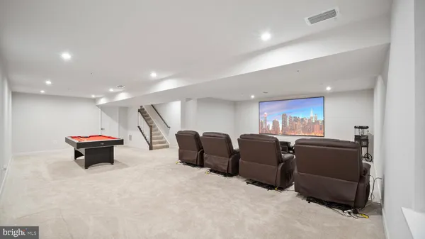 a living room with furniture and a couch