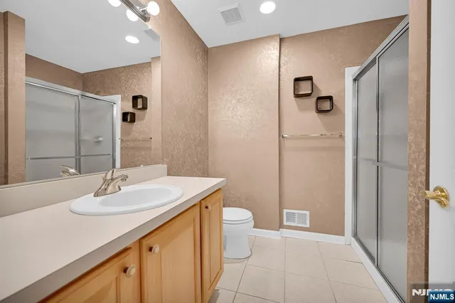 $595,000 | 219 Swathmore Drive, Nutley, NJ 07110