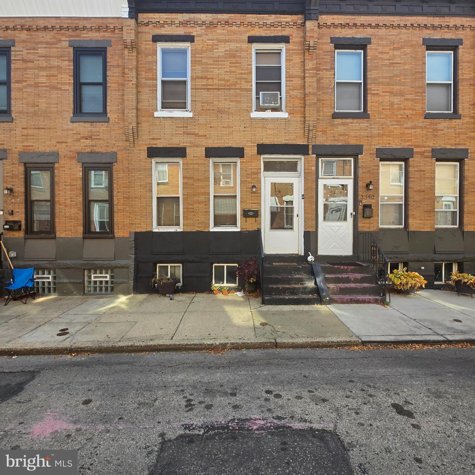 Charming brick facade in a vibrant neighborhood.