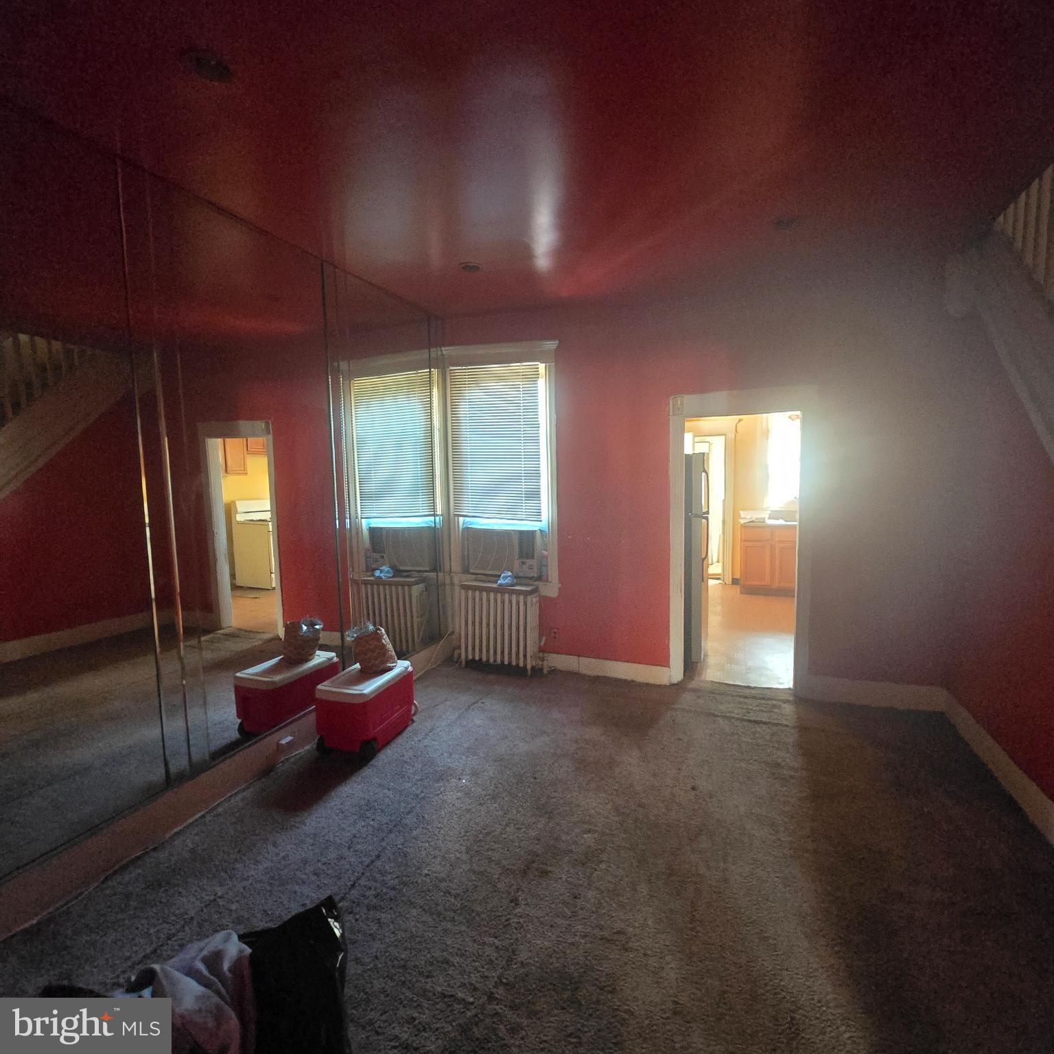 3338 West Sergeant Street Philadelphia, PA 19132 - Photo 3 of 17 Vibrant red walls enhance this unique space.