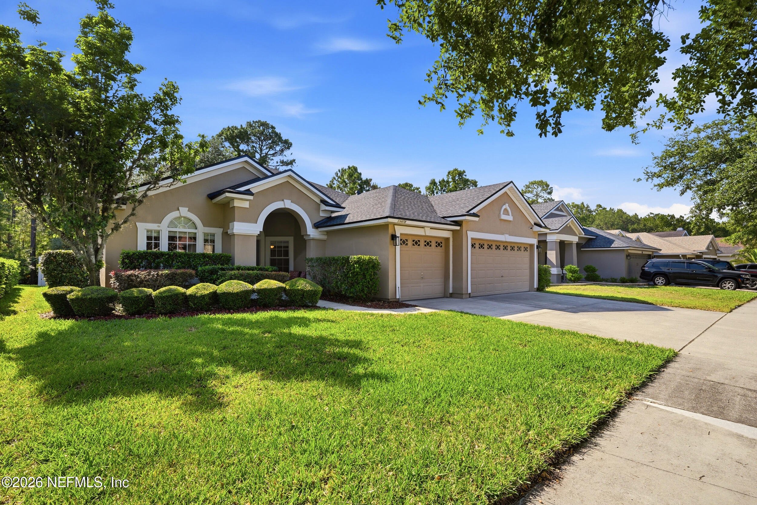14478 Millhopper Road Jacksonville, FL 32258 - Photo 2 of 57 expansive driveway with 3-car-garage
