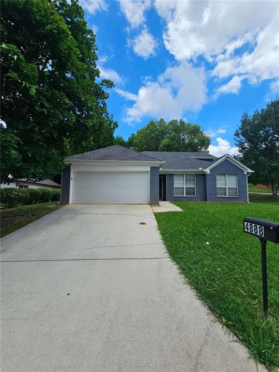 4888 Truitt Lane Decatur, GA 30035 - Photo 1 of 1 a front view of house with yard and green space