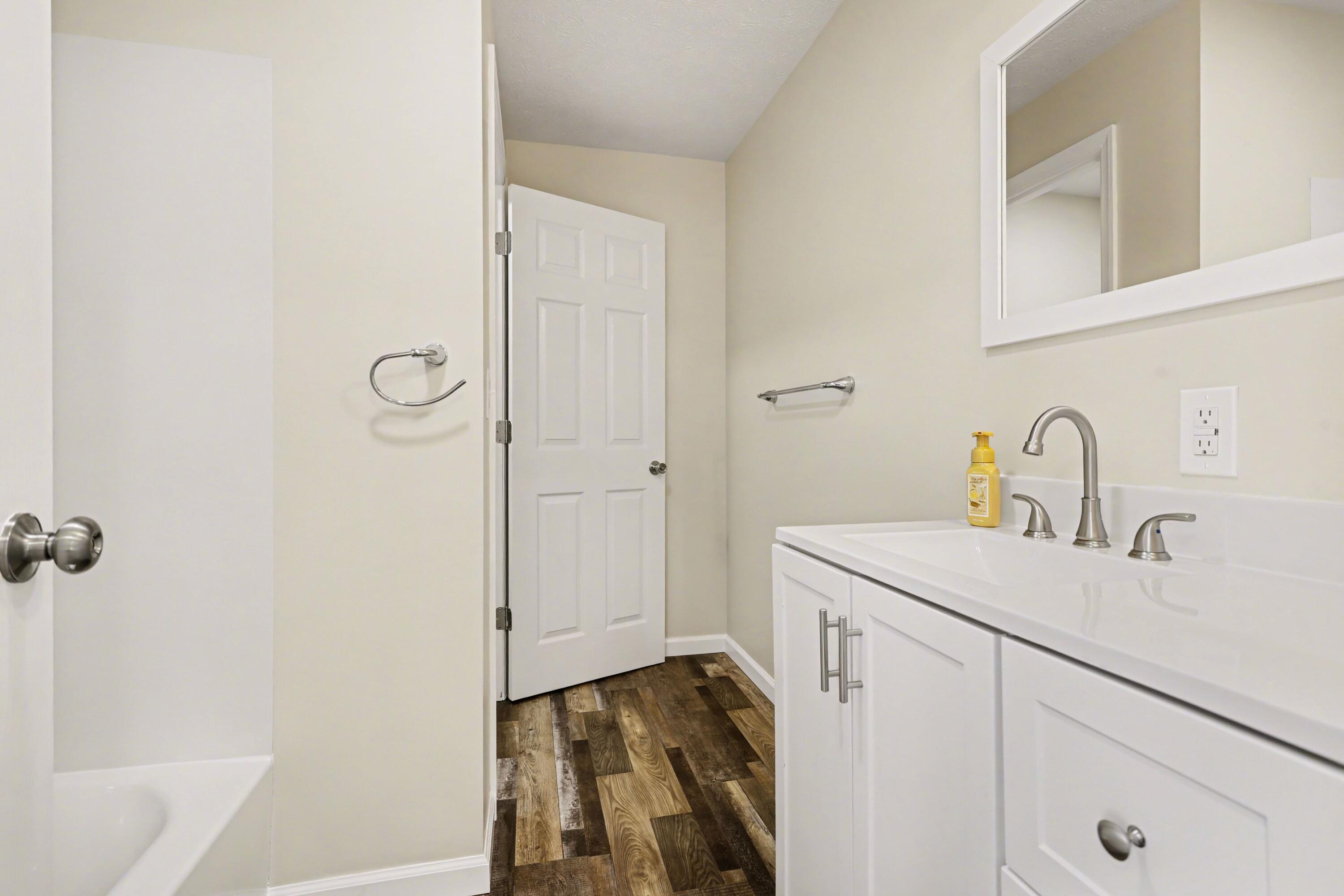 8891 Pennfield Road Battle Creek, MI 49014 - Photo 7 of 39 1st Floor Full Bathroom
