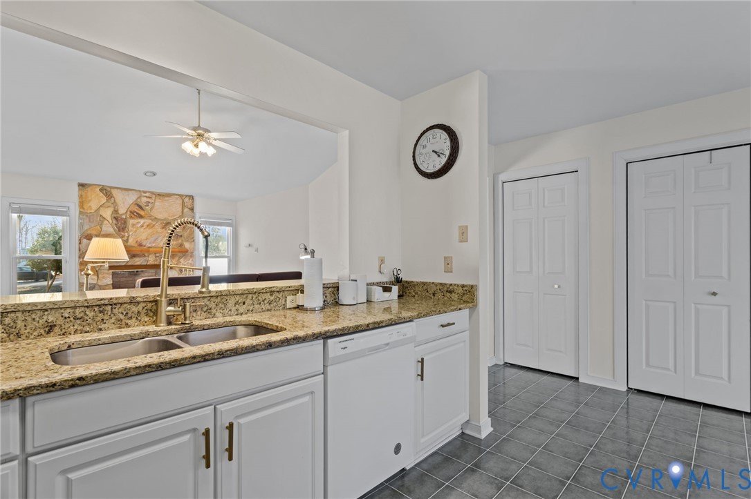 518 Rebel Ridge Road Colonial Heights, VA 23834 - Photo 23 of 44 a bathroom with a granite countertop double vanity sink and a mirror