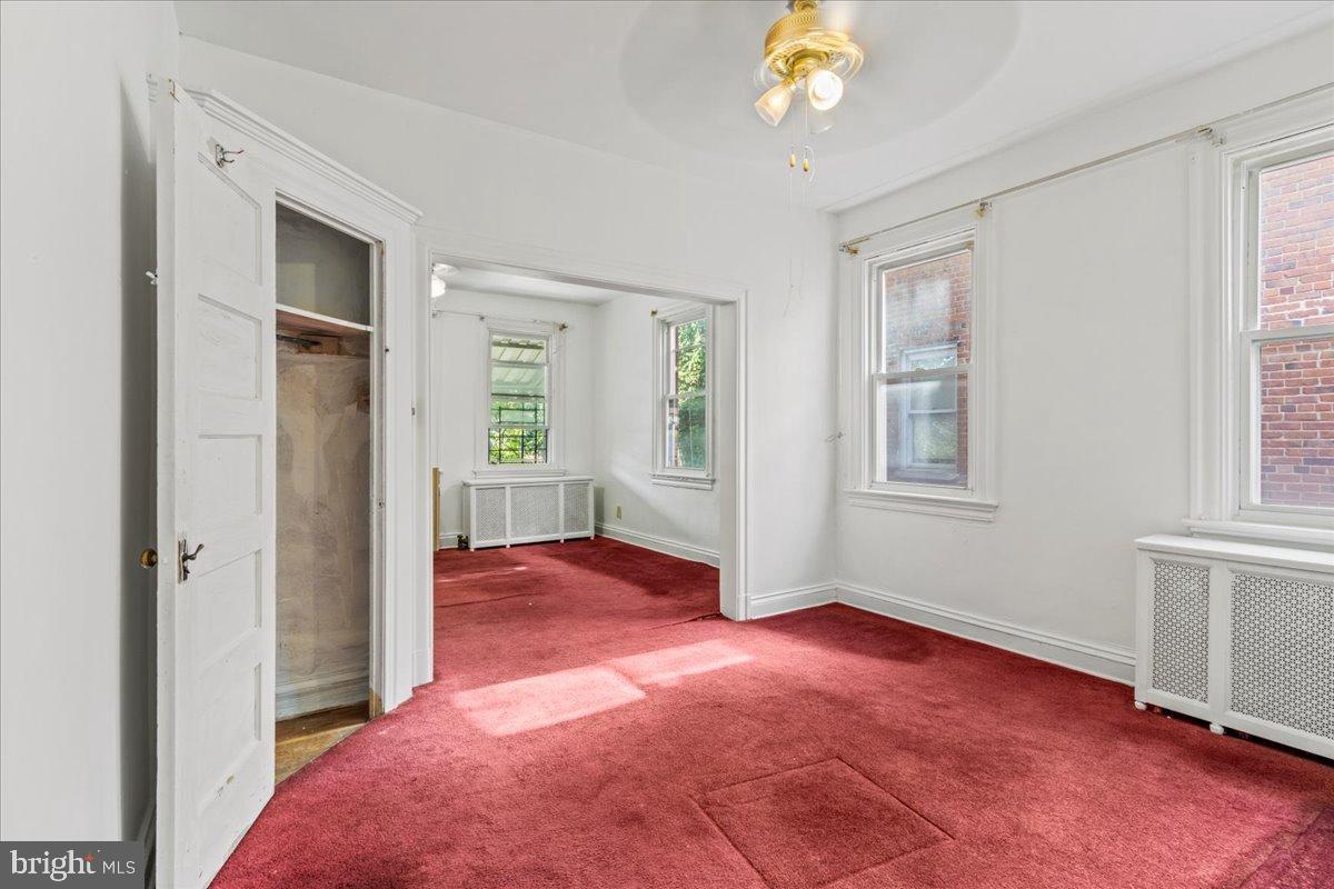 600 Tuckerman Street Northwest Washington, DC 20011 - Photo 2 of 24 an empty room with windows and closet