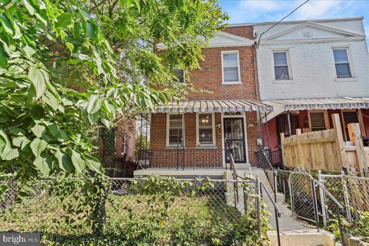 600 Tuckerman Street Northwest Washington, DC 20011 - Photo 21 of 24 front view of a house with a yard