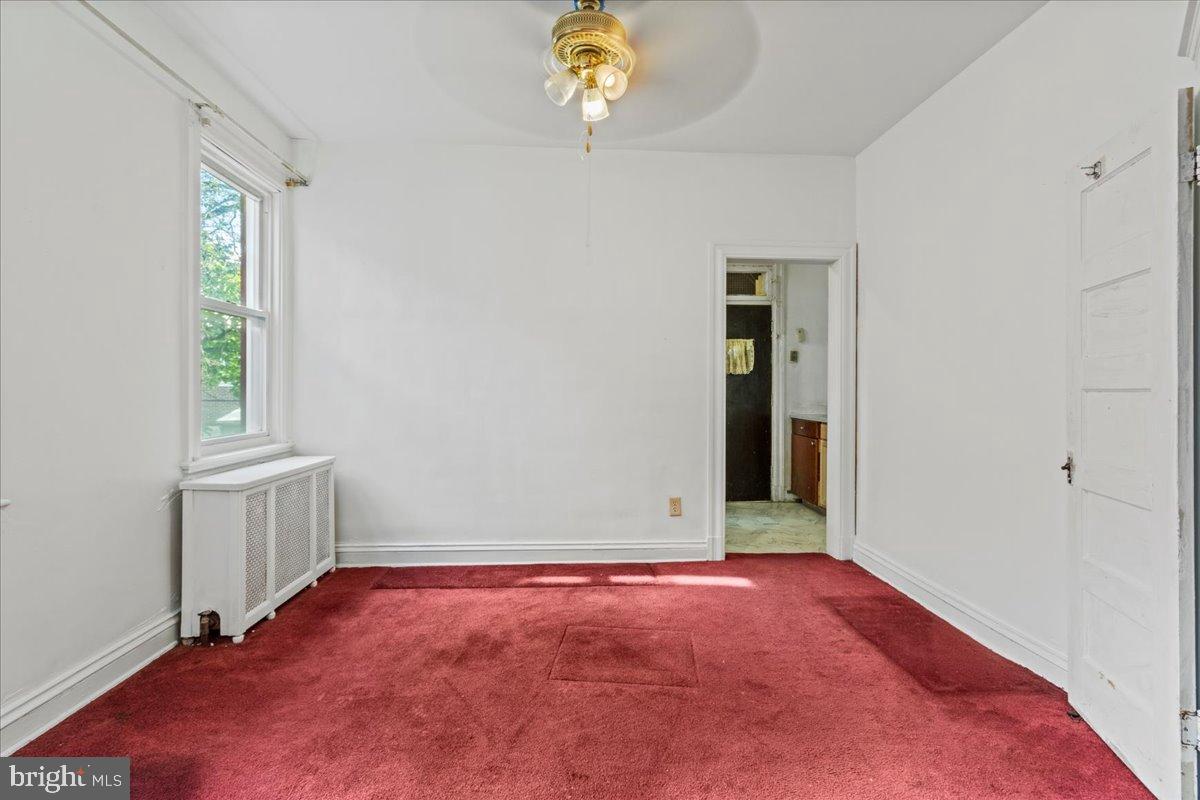 600 Tuckerman Street Northwest Washington, DC 20011 - Photo 4 of 24 an empty room with windows