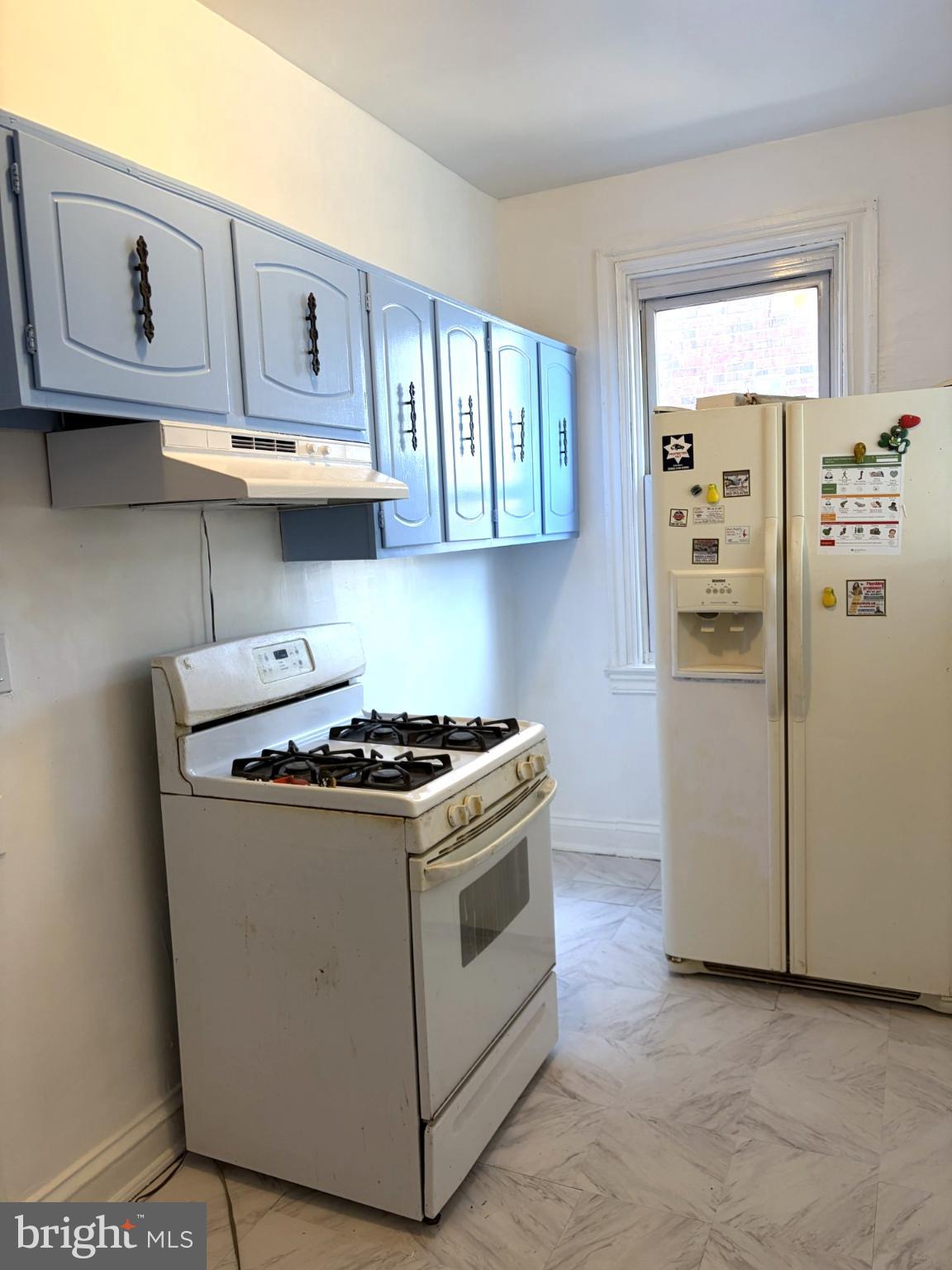 600 Tuckerman Street Northwest Washington, DC 20011 - Photo 6 of 24 a kitchen with stainless steel appliances granite countertop a stove a refrigerator and a cabinets