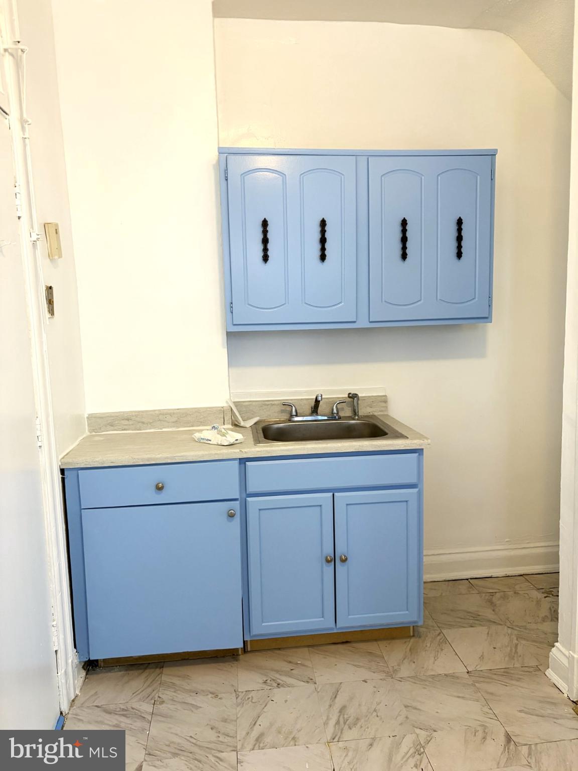 600 Tuckerman Street Northwest Washington, DC 20011 - Photo 7 of 24 a bathroom with a granite countertop sink and vanity