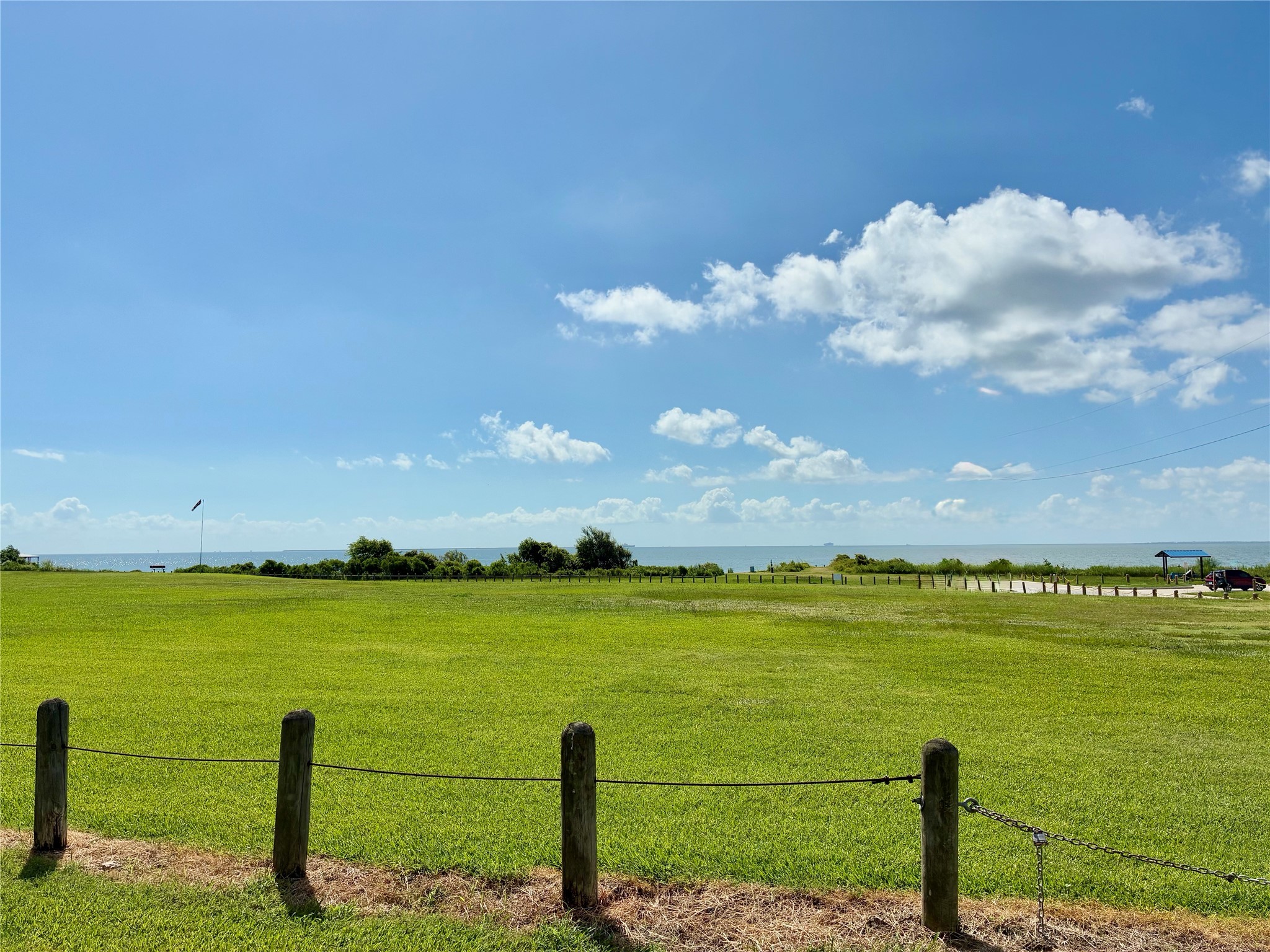 4727 Bland Street Pasadena, TX 77586 - Photo 16 of 17 a view of a lake with a big yard