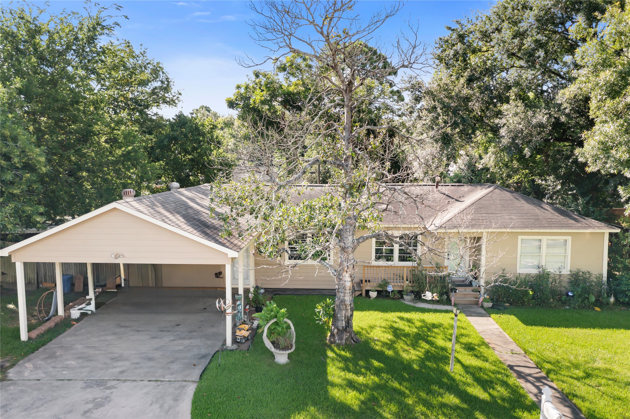 4727 Bland Street Pasadena, TX 77586 - Photo 3 of 17 a view of a house with a yard
