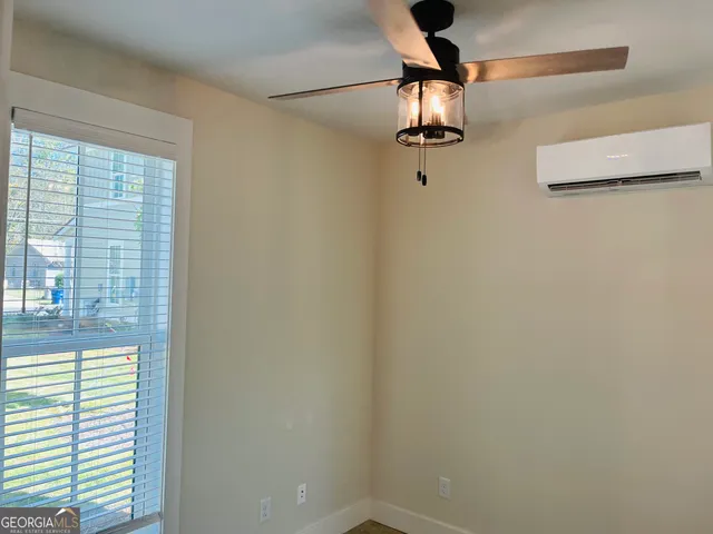 a view of a mirror and window in a room