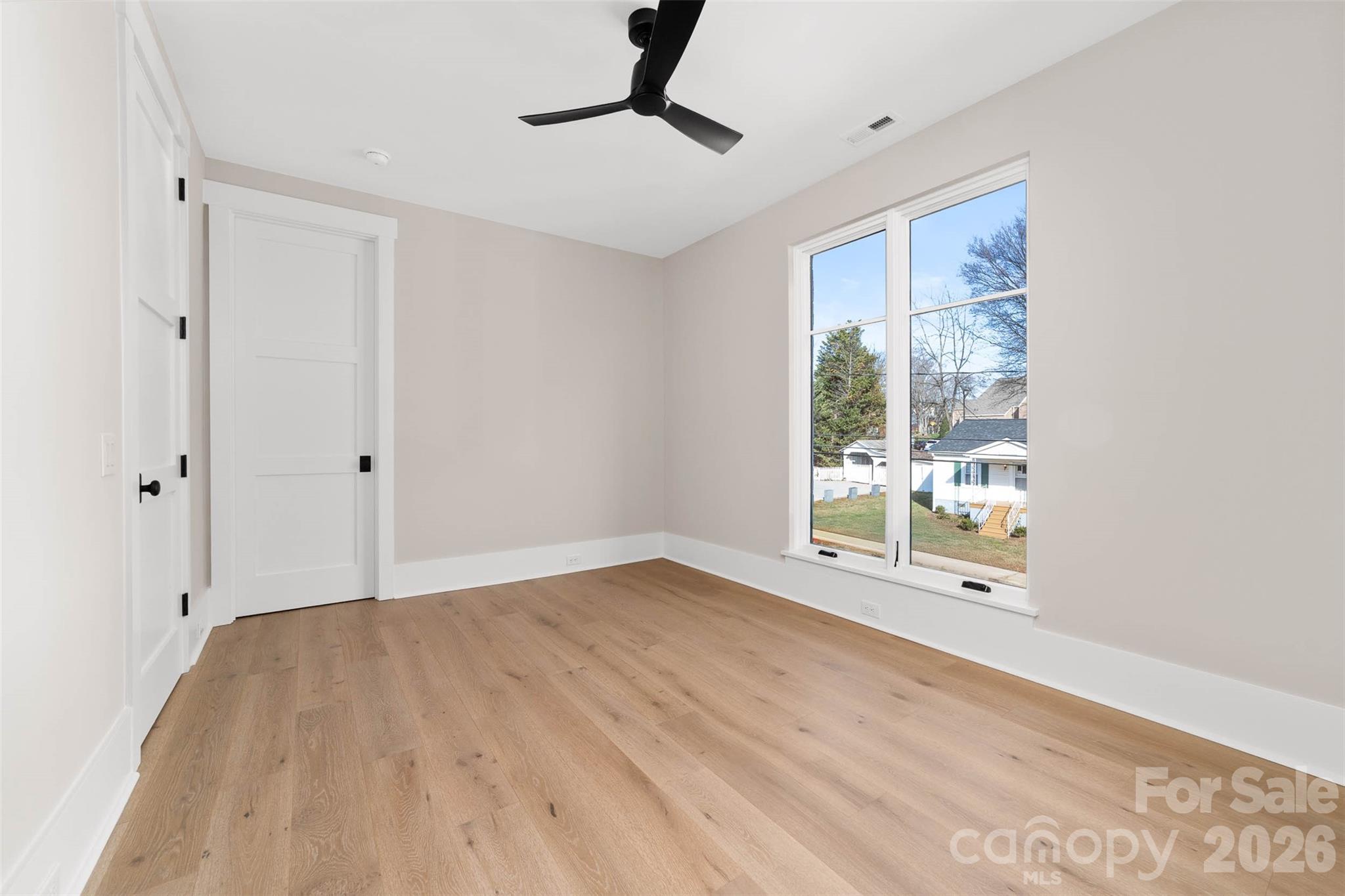 216 Walnut Street Davidson, NC 28036 - Photo 33 of 48 a view of an empty room with a window