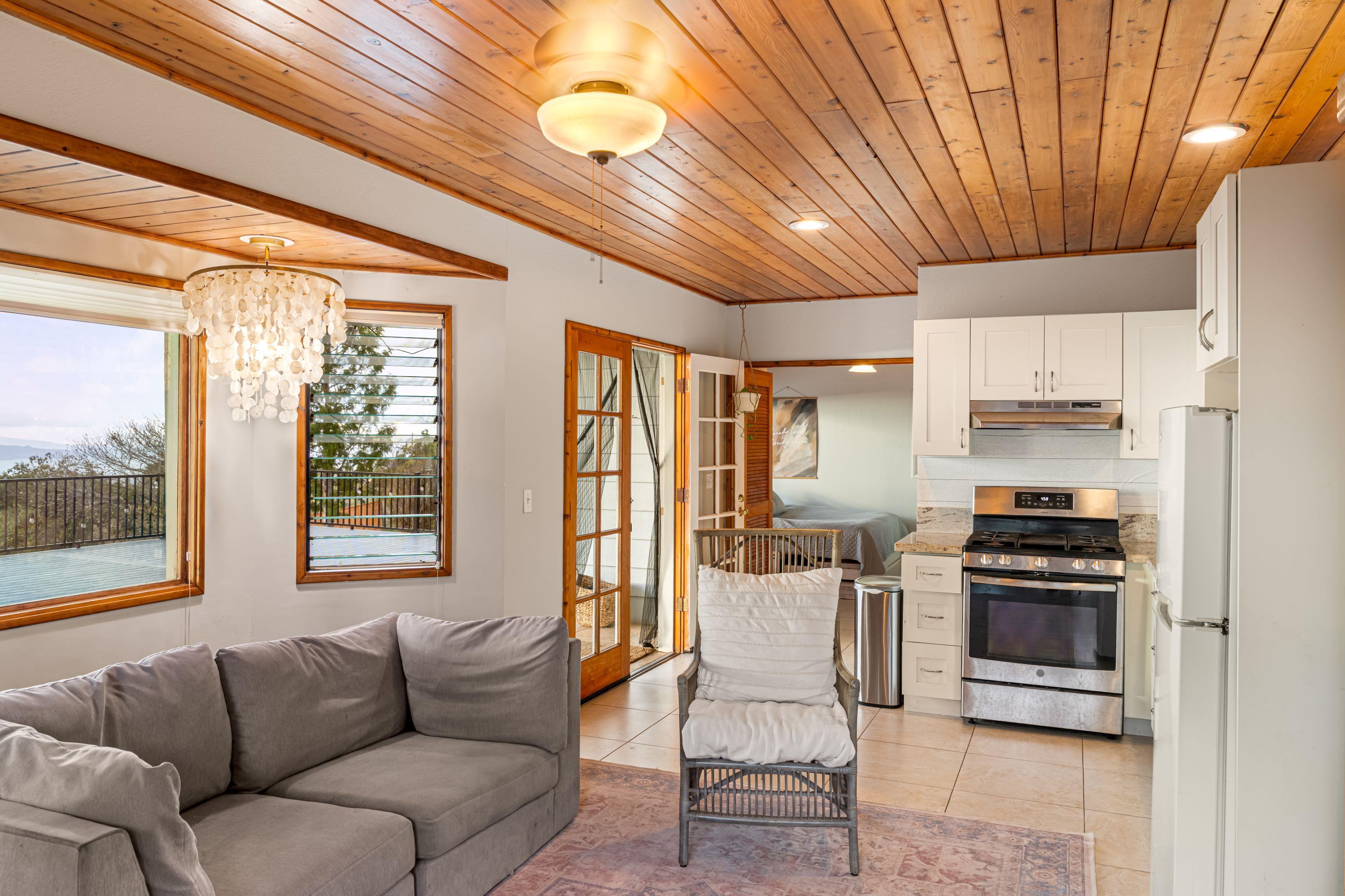 216 Keoni Place Kula, HI 96790 - Photo 13 of 29 a view of kitchen with furniture and large window