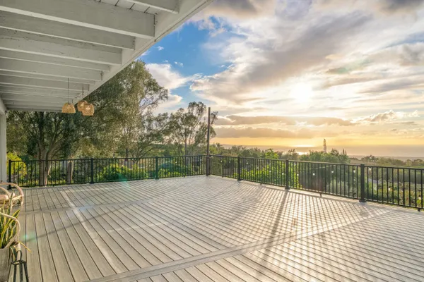 a view of a terrace with a lake view