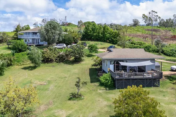 a kitchen with a stove a sink and a refrigerator