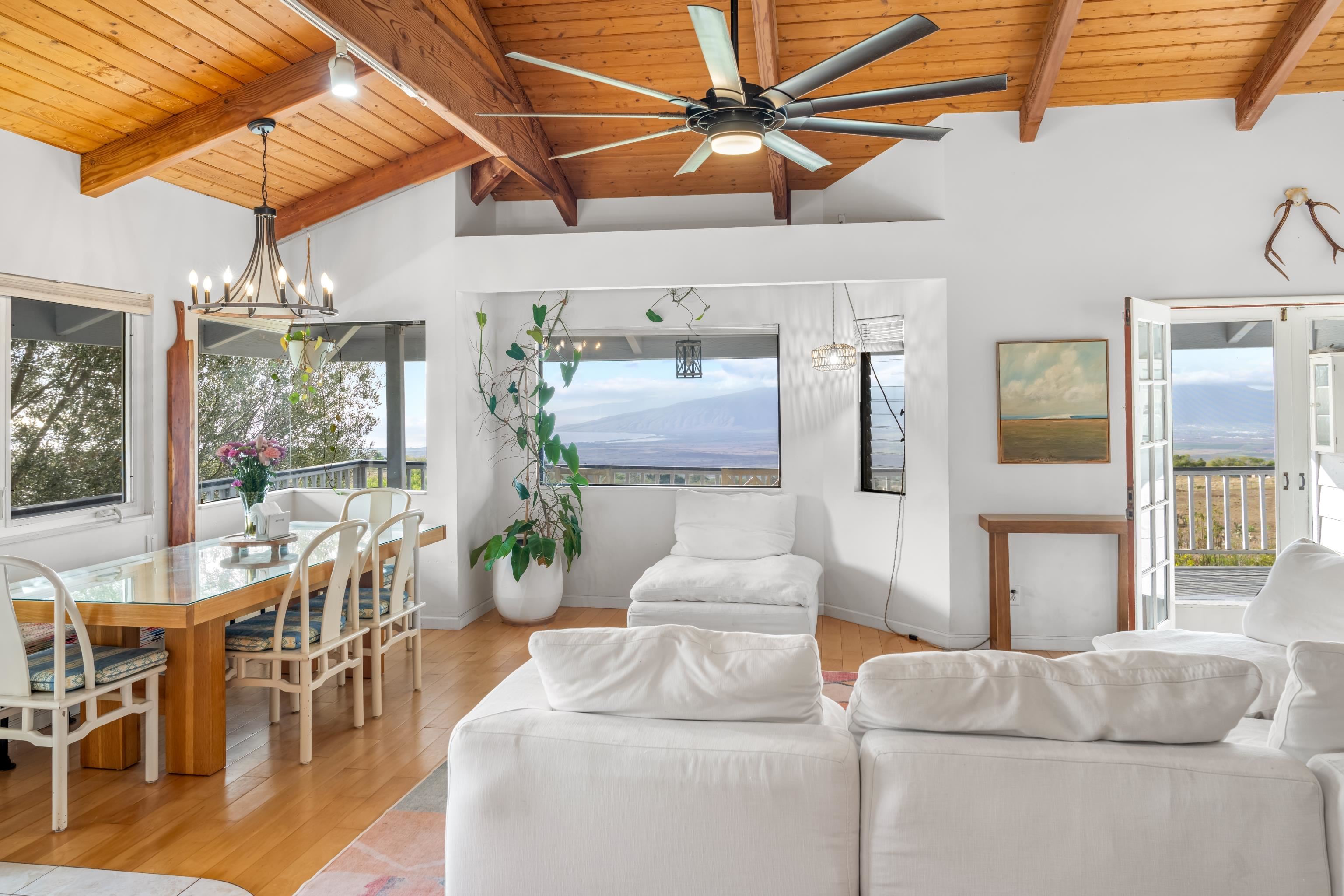 216 Keoni Place Kula, HI 96790 - Photo 6 of 29 a living room with furniture and a ceiling fan