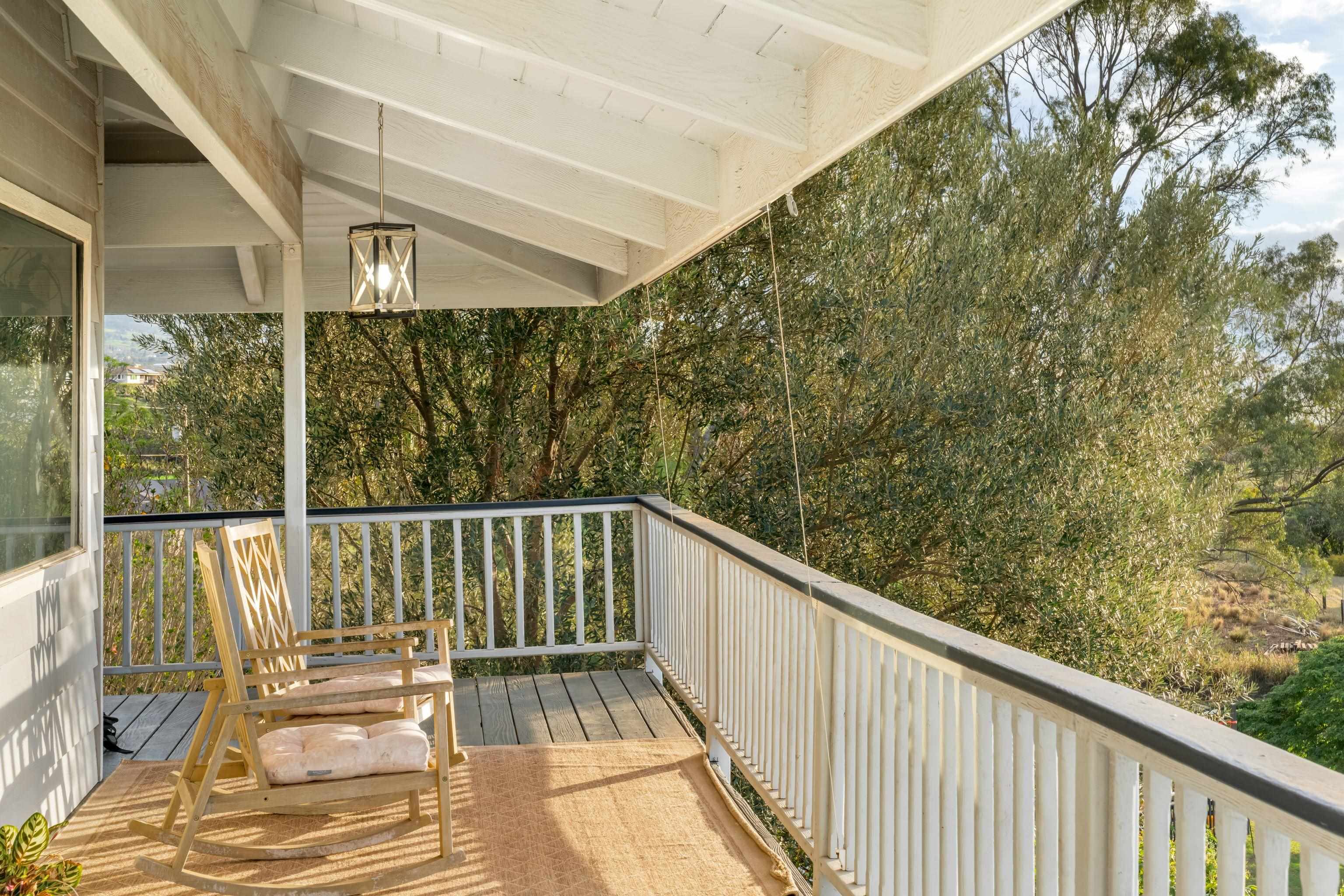 216 Keoni Place Kula, HI 96790 - Photo 8 of 29 a view of a balcony with wooden floor
