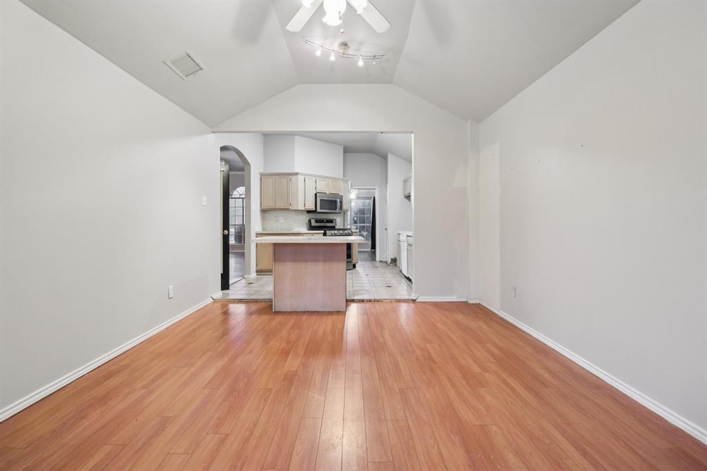 600 North Chattey Road DeSoto, TX 75115 - Photo 40 of 40 a view of a kitchen with wooden floor and electronic appliances