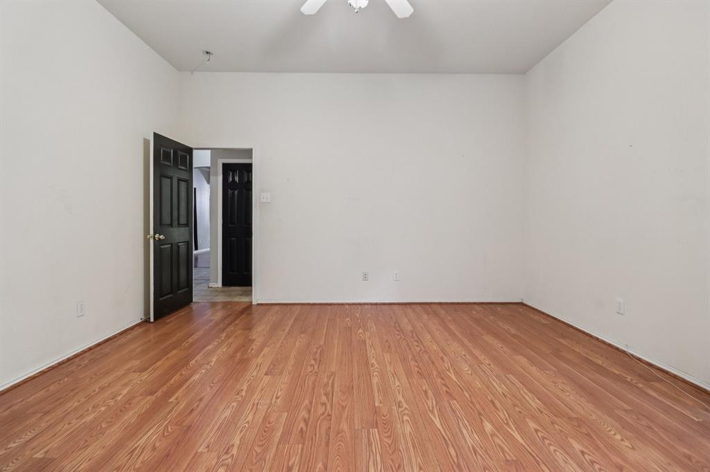 600 North Chattey Road DeSoto, TX 75115 - Photo 24 of 40 a view of an empty room with wooden floor