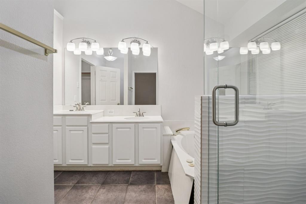 600 North Chattey Road DeSoto, TX 75115 - Photo 27 of 40 a bathroom with a double vanity sink mirror and vanity