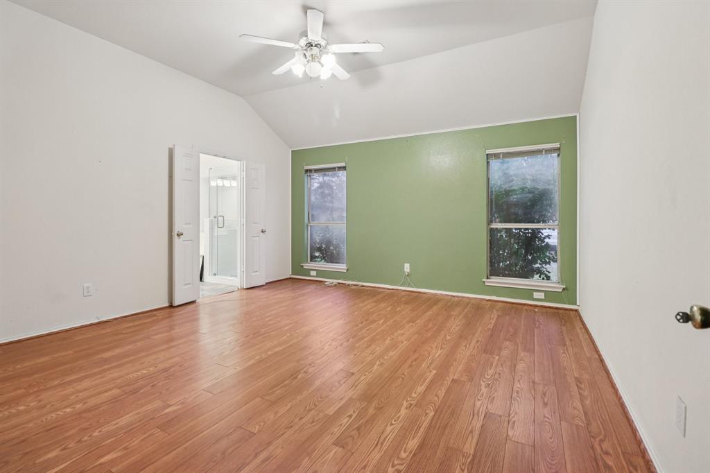 600 North Chattey Road DeSoto, TX 75115 - Photo 6 of 40 wooden floor in an empty room with a window