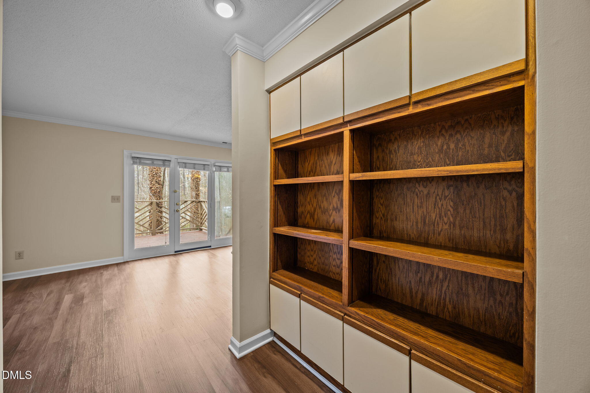 3112 Coachman's Way Durham, NC 27705 - Photo 13 of 32 a view of walk in closet with empty racks