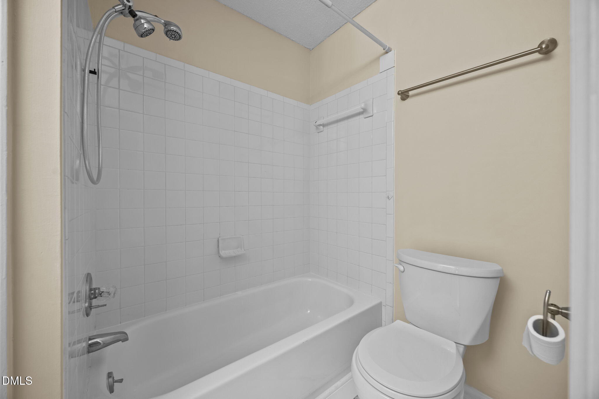 3112 Coachman's Way Durham, NC 27705 - Photo 22 of 32 a white toilet sitting next to a bath tub