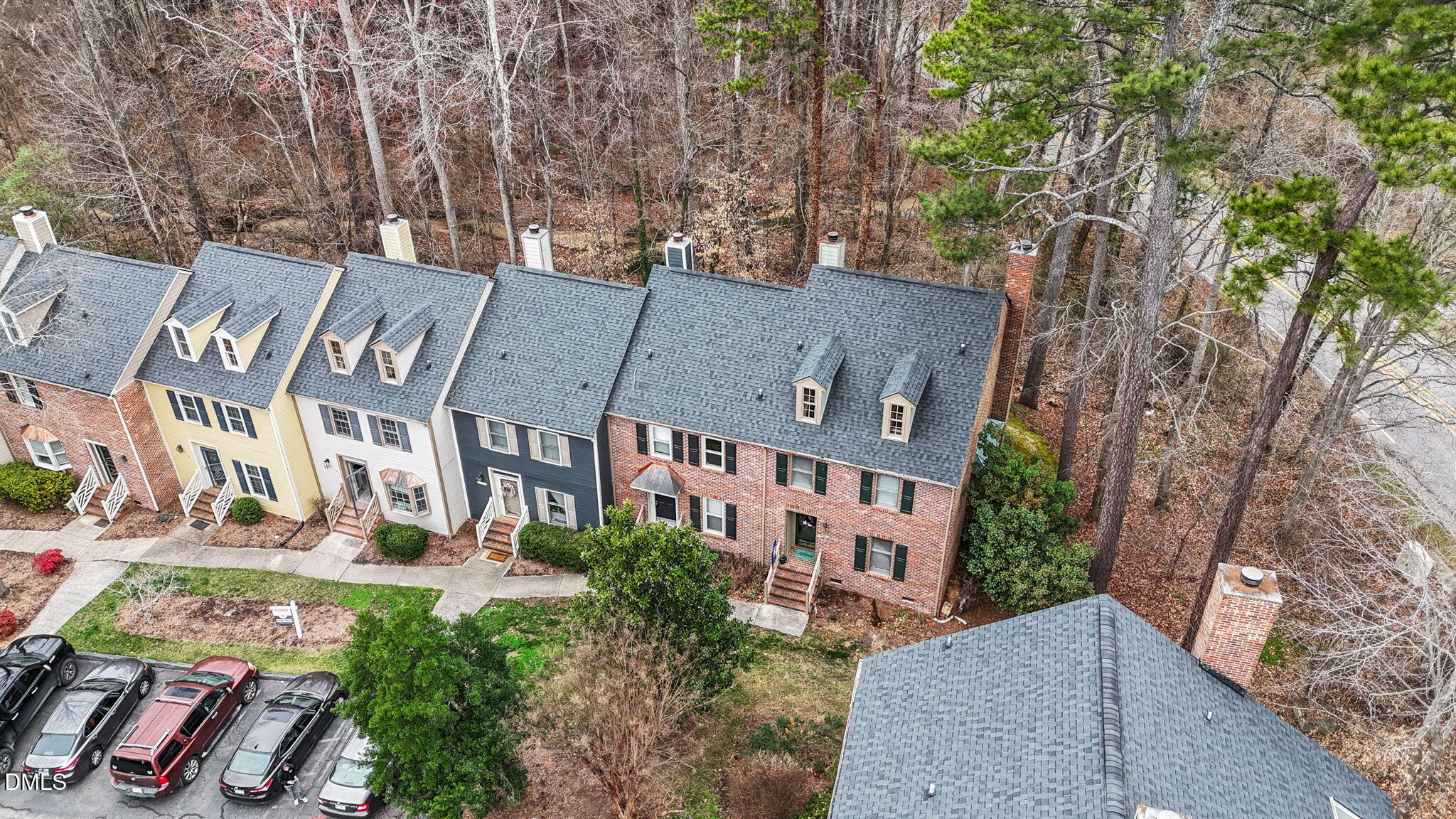3112 Coachman's Way Durham, NC 27705 - Photo 2 of 32 front view of a building with a yard