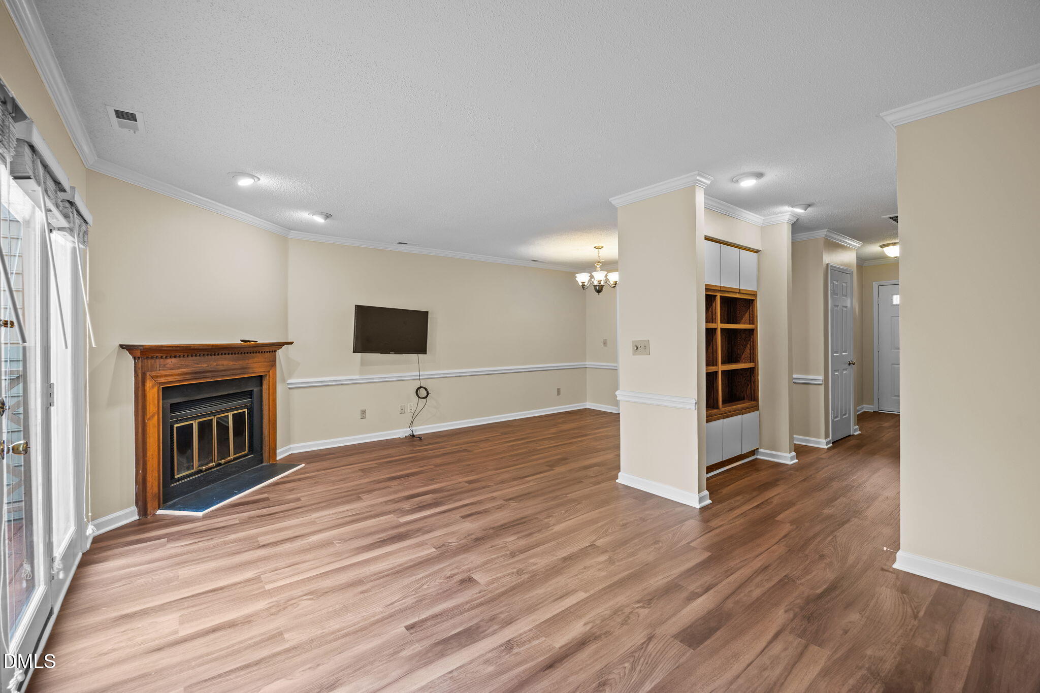 3112 Coachman's Way Durham, NC 27705 - Photo 6 of 32 a view of a livingroom with wooden floor