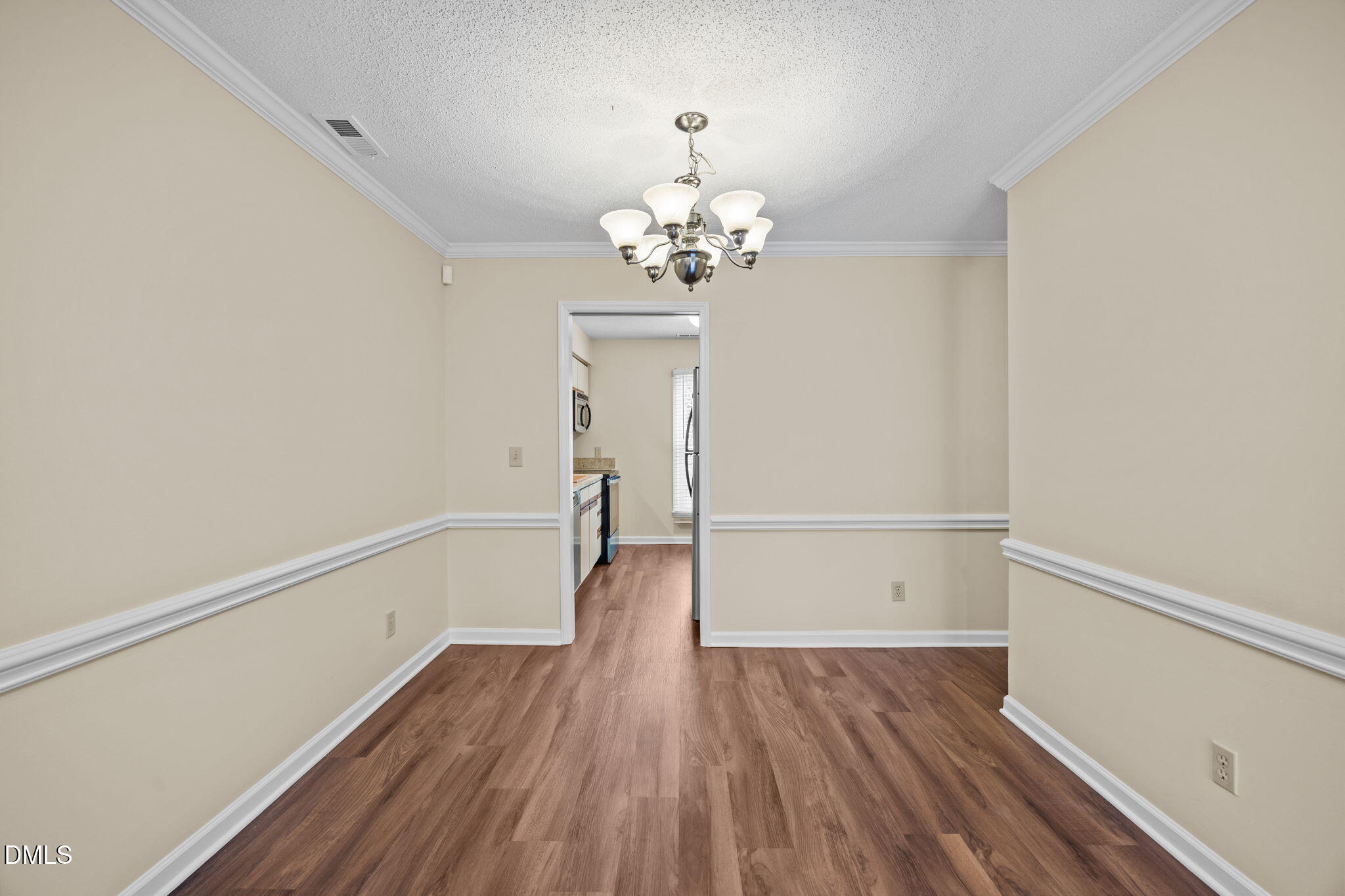 3112 Coachman's Way Durham, NC 27705 - Photo 7 of 32 a view of a room with wooden floor and ceiling window