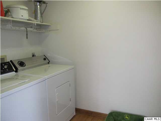 15 Oak Grove Road Palmyra, VA 22963 - Photo 16 of 25 a utility room with dryer and washer