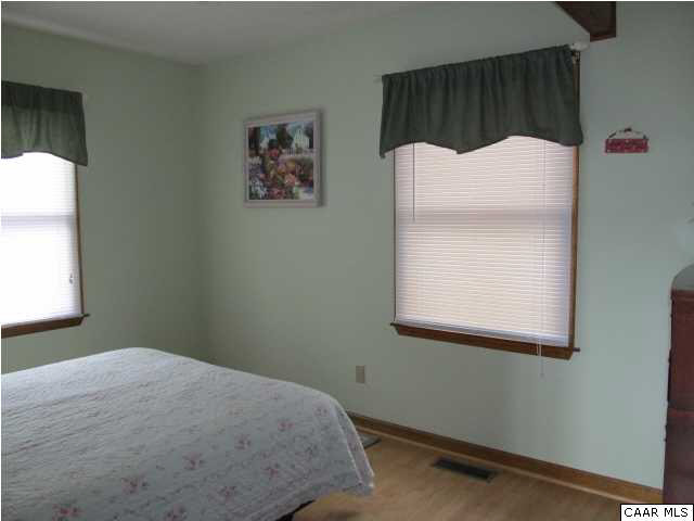 15 Oak Grove Road Palmyra, VA 22963 - Photo 17 of 25 a bed room with a bed