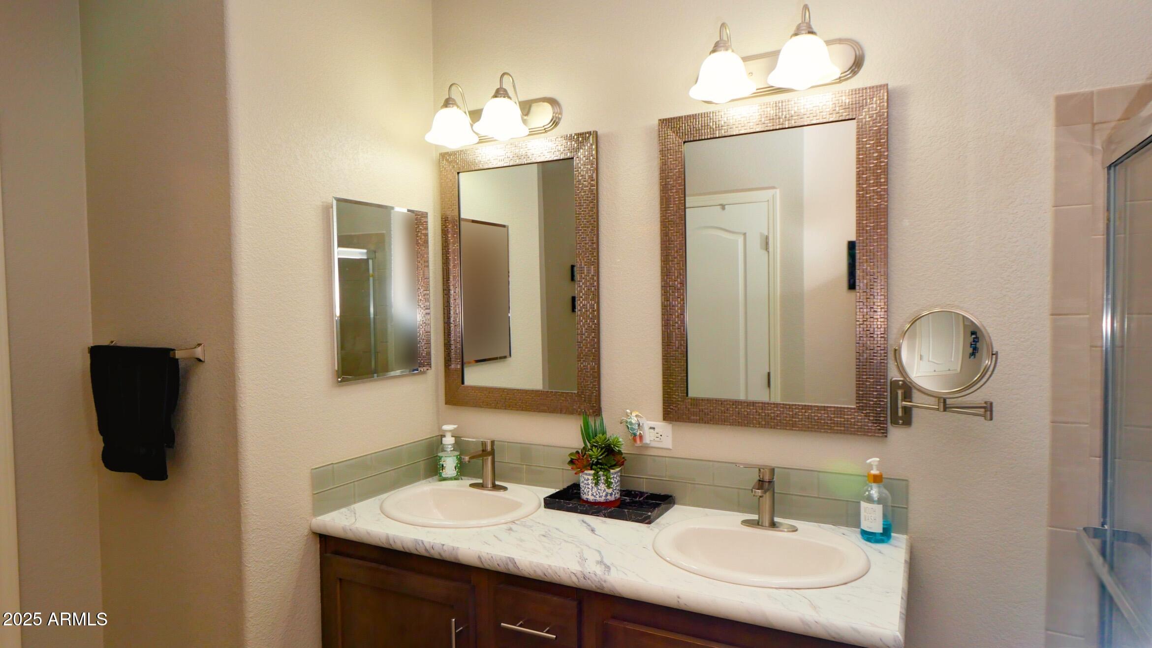 2929 East Main Street, Unit 116 Mesa, AZ 85213 - Photo 15 of 39 a bathroom with a sink and a mirror